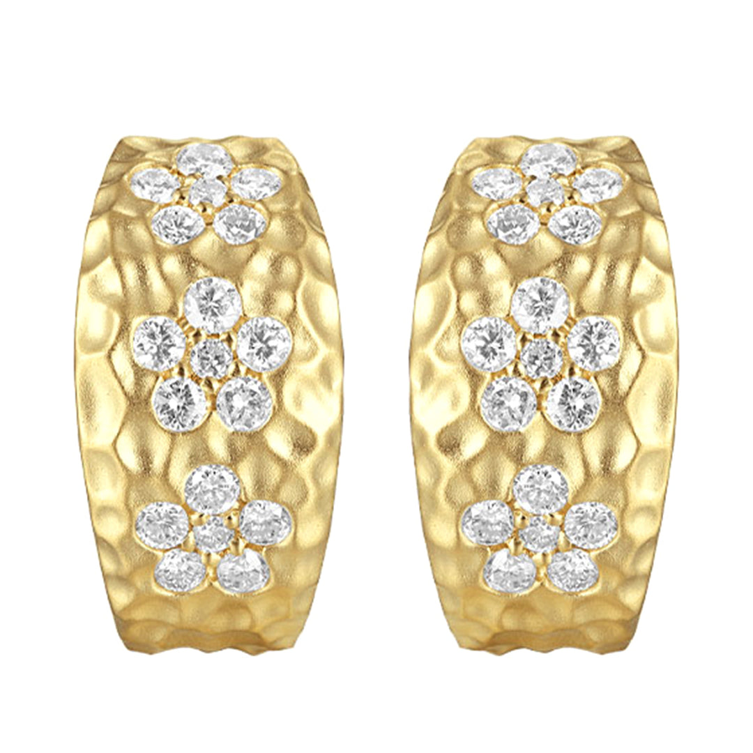 These captivating yellow gold earrings showcase floral designs made of brilliant diamonds set against gleaming gold. Accompanied by heart-shaped fastenings,  they embody natures elegance.