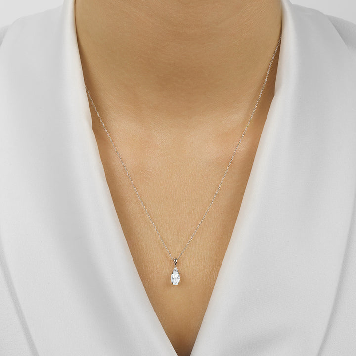 10Kt White Gold Diamond 1/50Ctw & White Topaz 3/8Ctw Pendant
