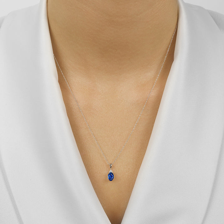 10Kt White Gold Diamond 1/50Ctw & Sapphire 3/8Ctw Pendant