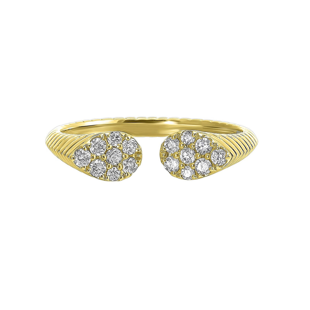 This exquisitely textured yellow gold ring is a royal masterpiece. Its band tapers towards two pear-shaped diamond clusters, converging to create a profile that captures the essence of regal charm.