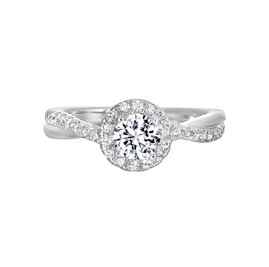 This feminine, modern diamond halo engagement ring features two strands, one with metal and one with pave diamonds intertwined in love.