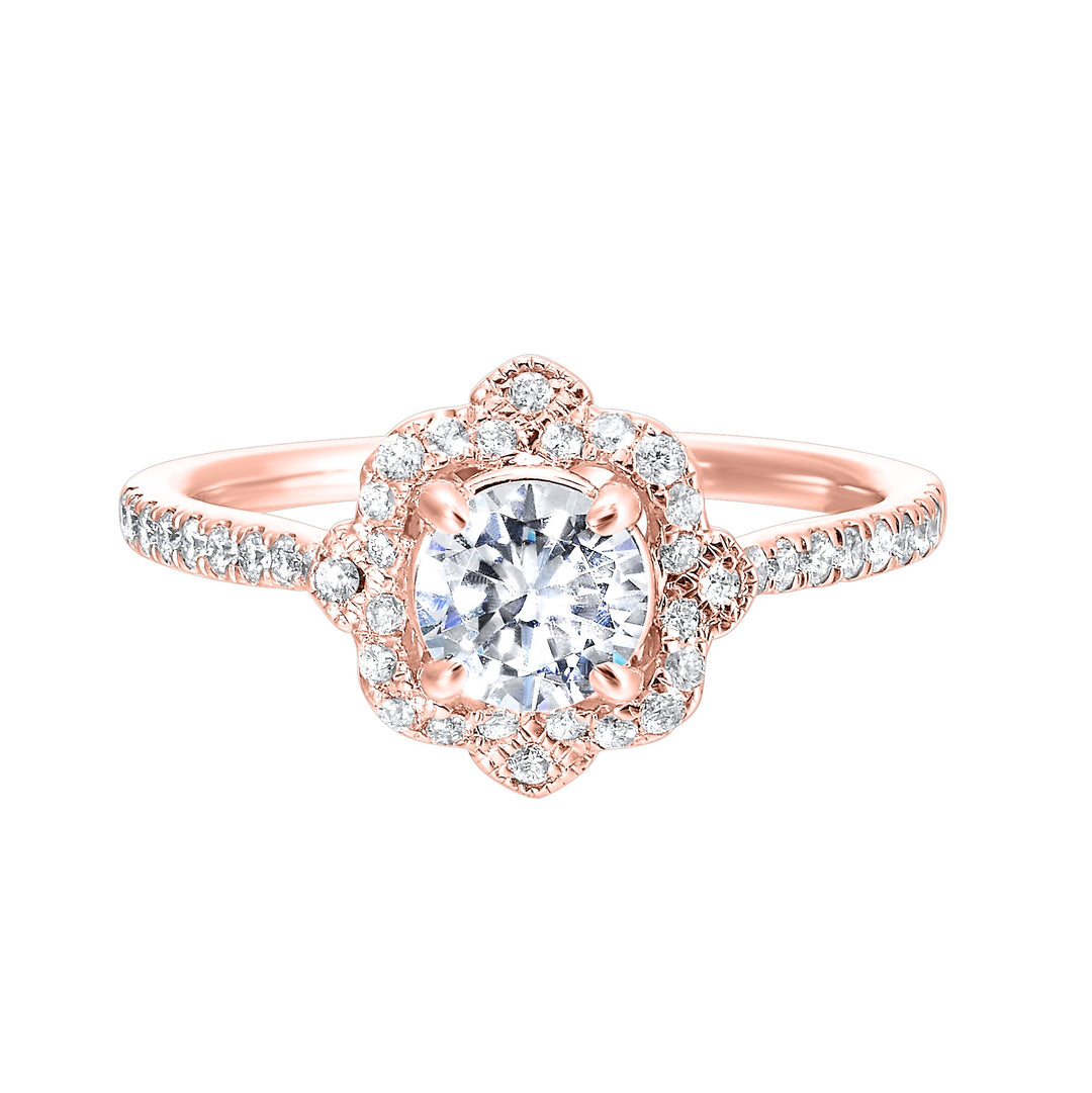 Floral halo with a clover air gap around center and delicate milgrain adds a vintage charm. Its adorned with pave set diamonds on the shank.