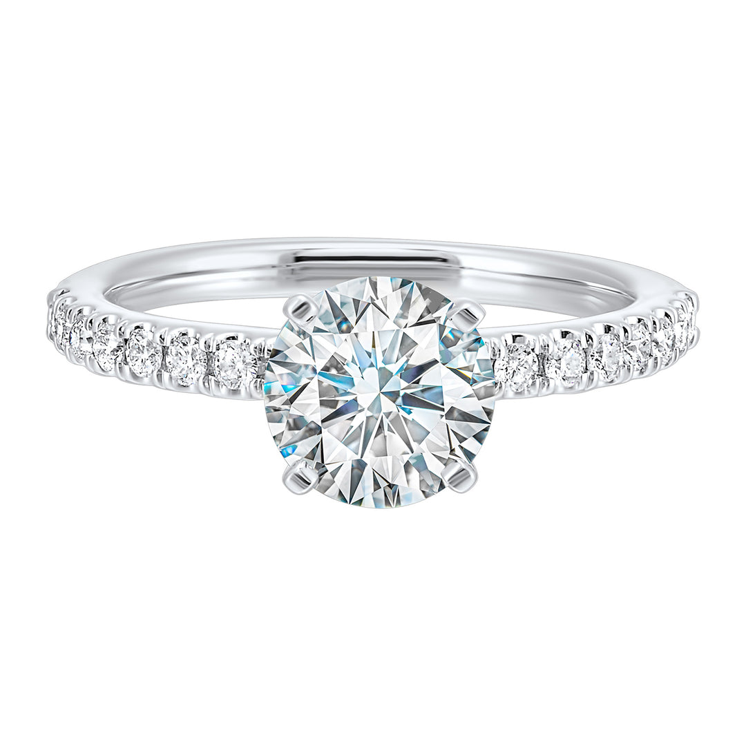 Classic and ready to make you shine, this ring features diamonds set in pave with a center solitaire.