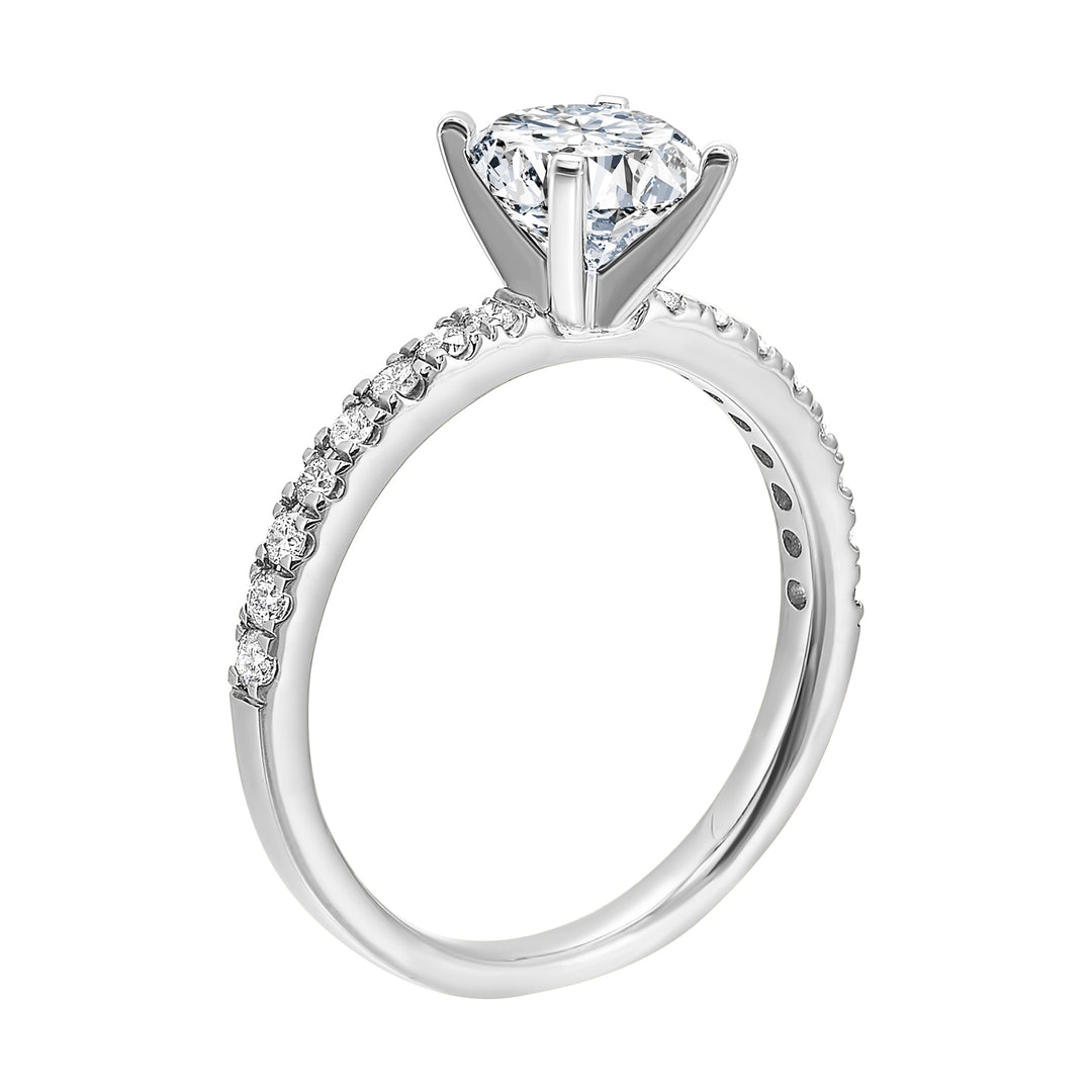 Classic and ready to make you shine, this ring features diamonds set in pave with a center solitaire.