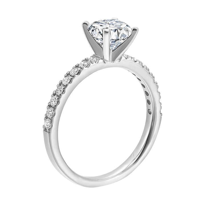 Classic and ready to make you shine, this ring features diamonds set in pave with a center solitaire.