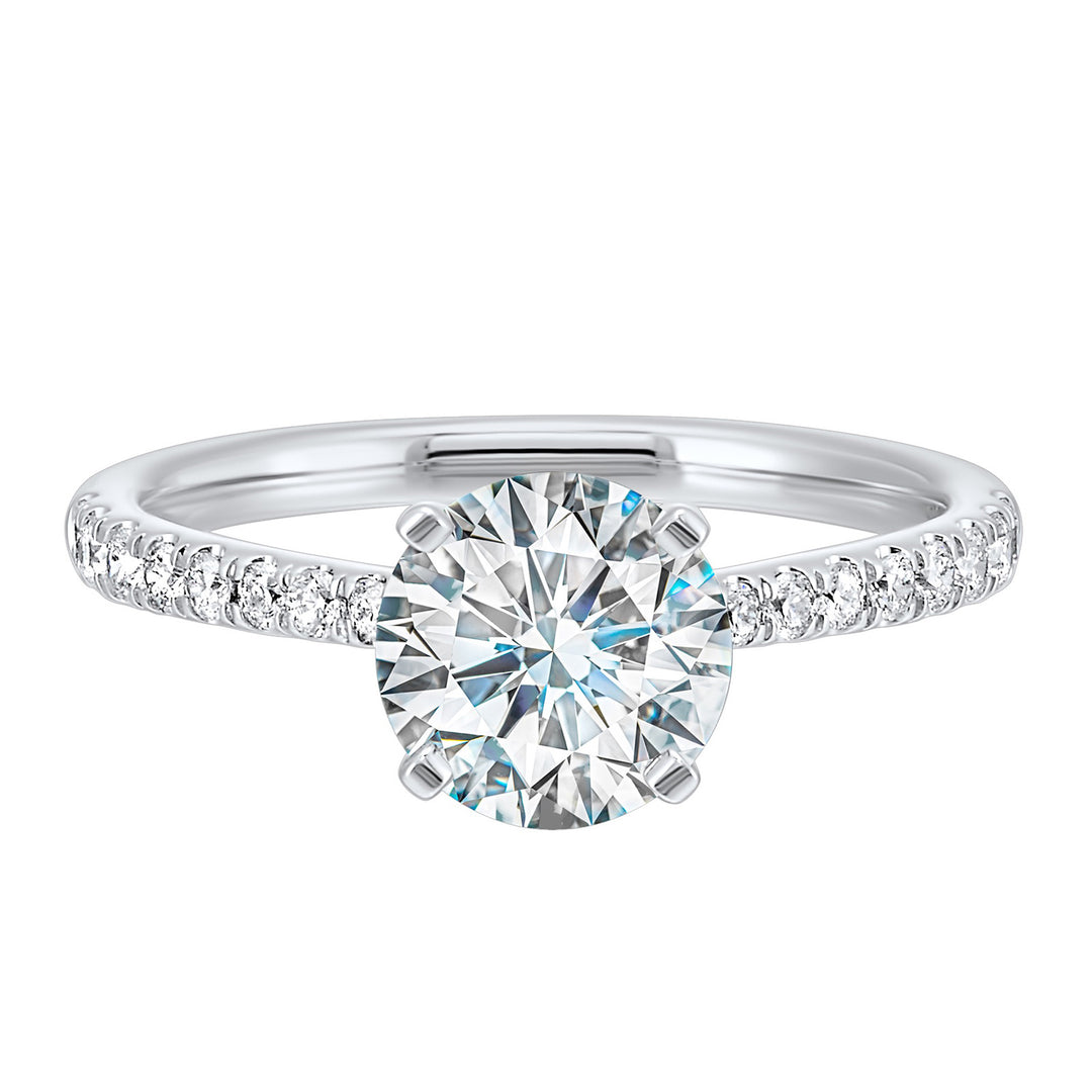 Petite set diamonds adds excitement to this classic solitaire ring perfectly showcases timeless love for her.