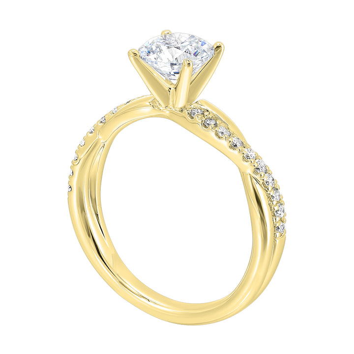 A stunning solitaire, embraced by a criss cross shank adorned with alternating flow of dazzling diamonds is sure to captivate her look.