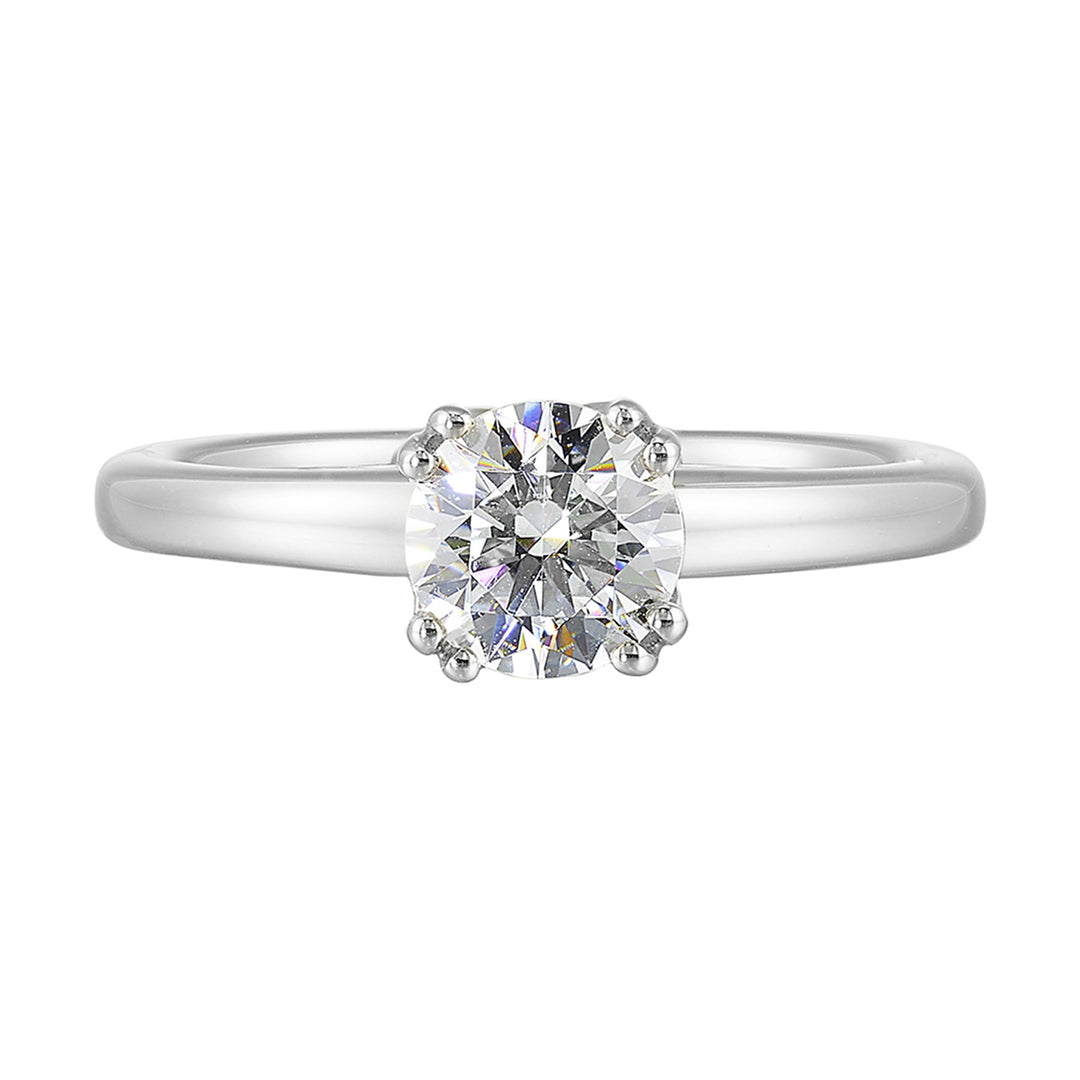 Chic and unique, this double prong setting solitare adds to the sleek, classic look to her style.