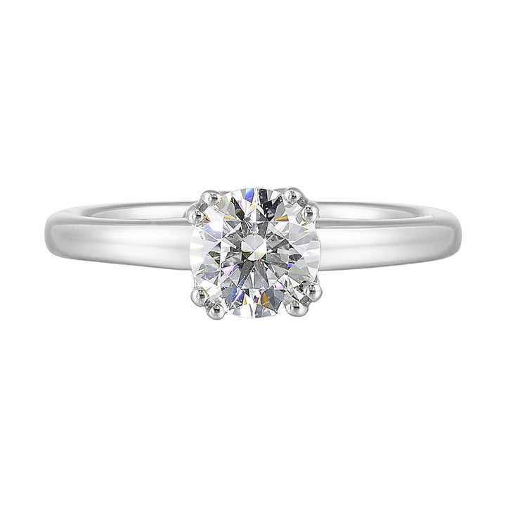 Chic and unique, this double prong setting solitare adds to the sleek, classic look to her style.