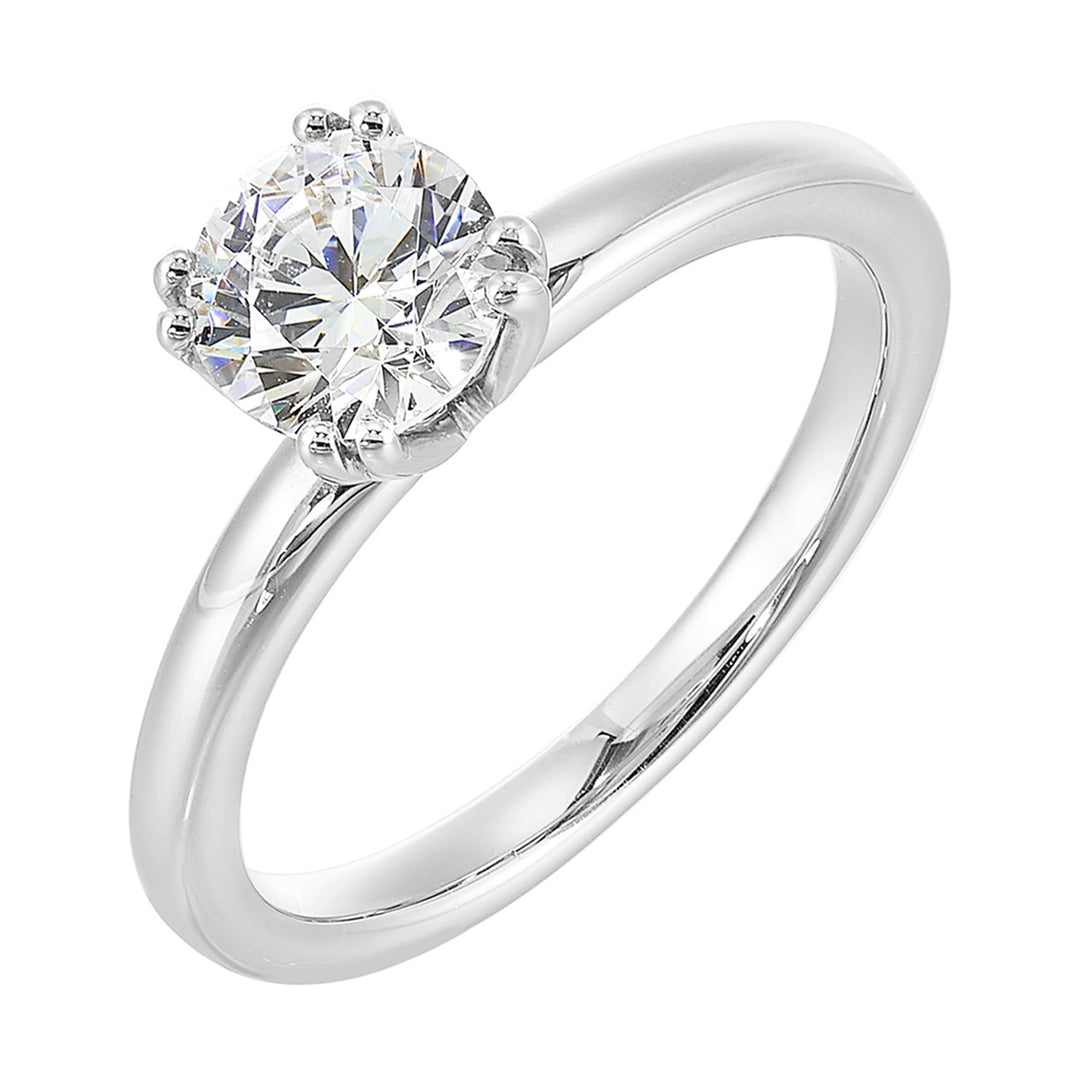 Chic and unique, this double prong setting solitare adds to the sleek, classic look to her style.