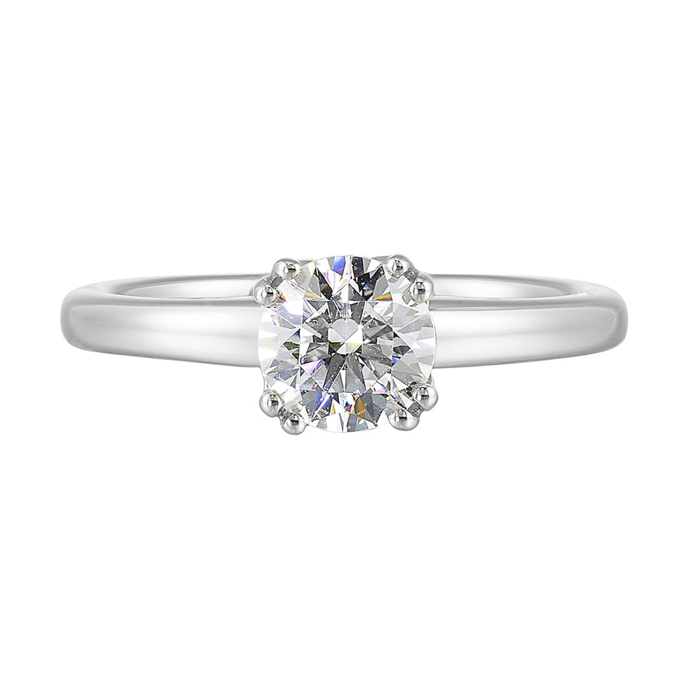 Chic and unique,  this double prong setting solitare adds to the sleek,  classic look to her style.
