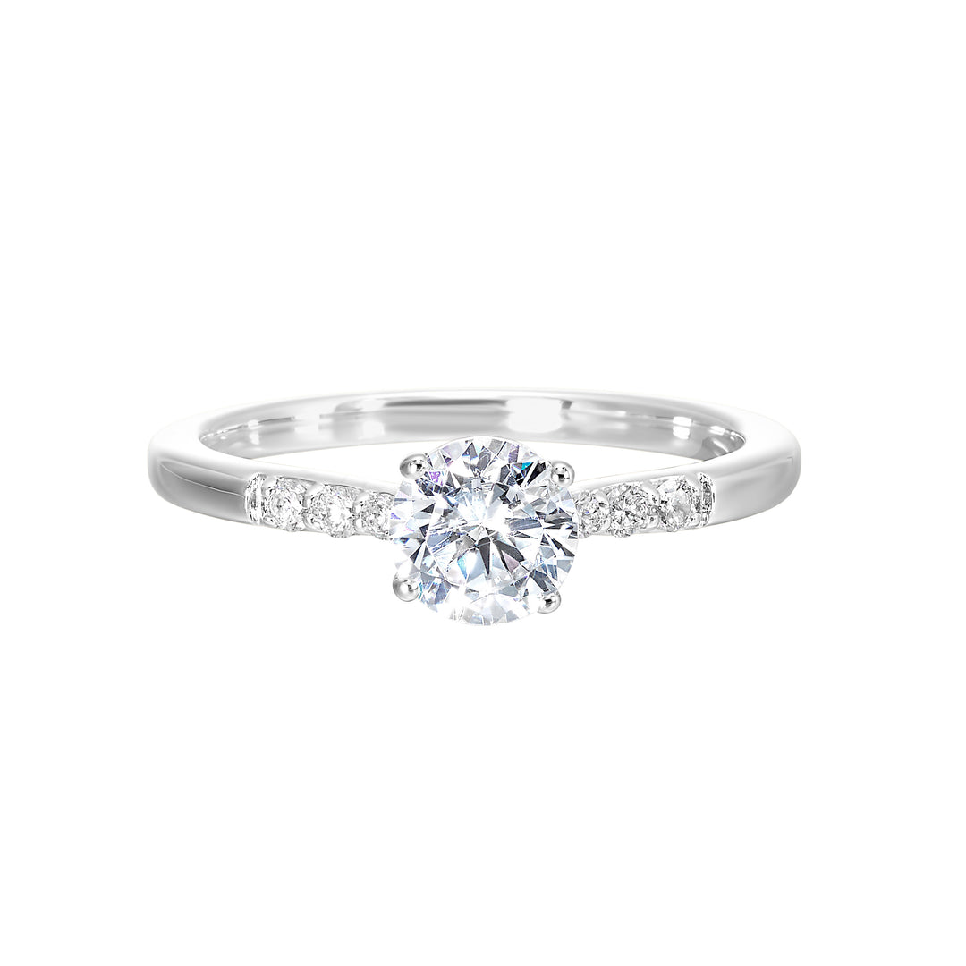 Complement your center diamond perfectly with accented pave-set diamonds along the shoulders of the shank.
