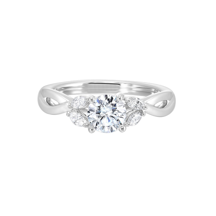 Gorgeous three stone twist engagement ring with added marquise on the shoulders highlights the center further.