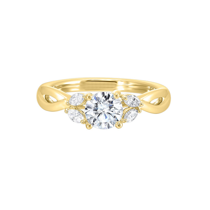 Gorgeous three stone twist engagement ring with added marquise on the shoulders highlights the center further.
