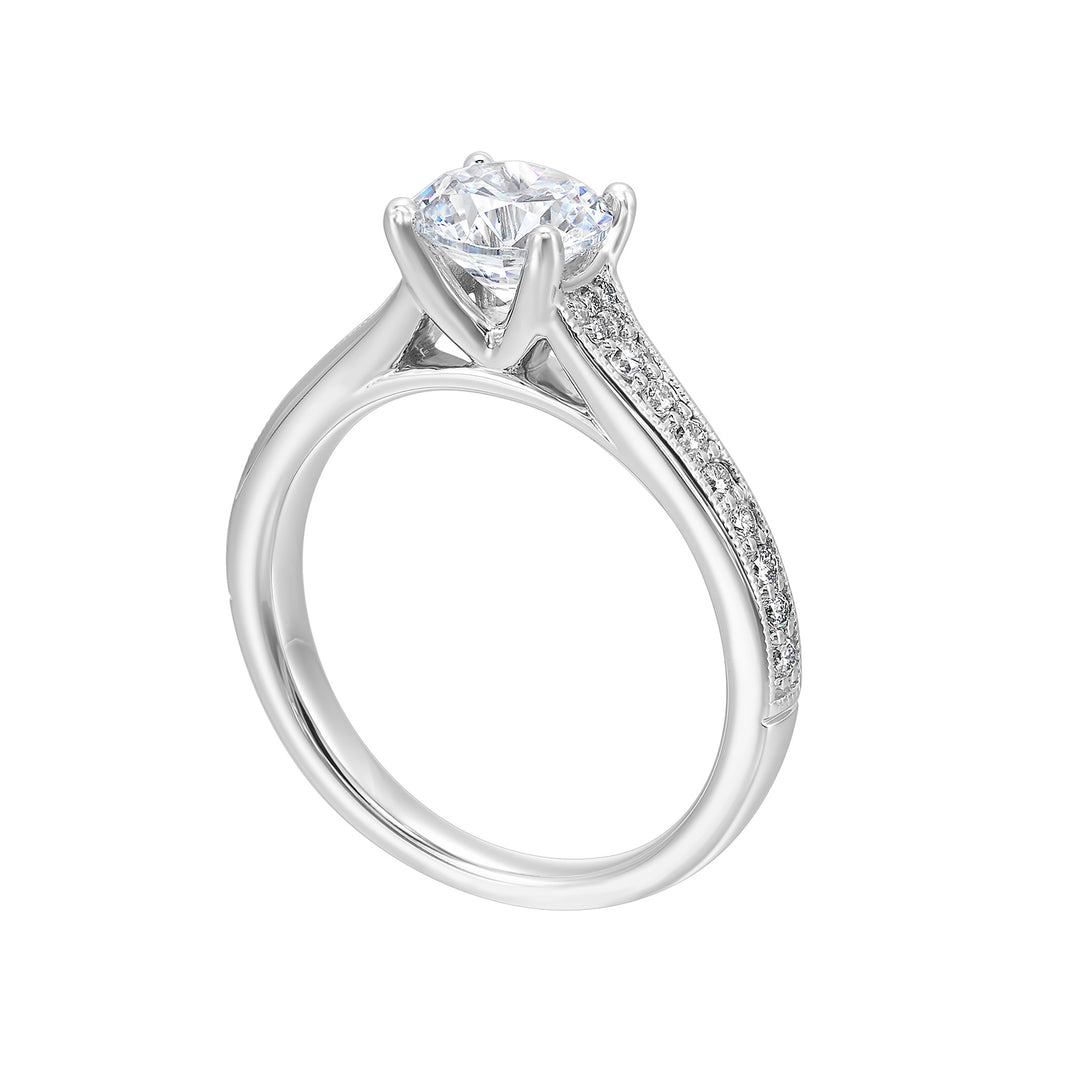 Reverse tapered shank with milgrain on both the sides perfectly compliments the center stone to create a beautiful and elegant look.