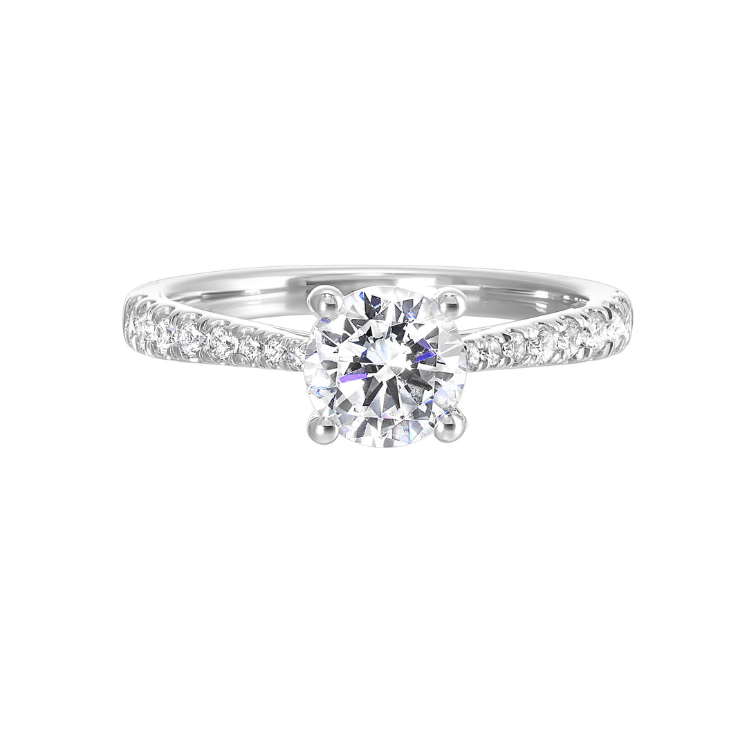 Delicate pave diamonds pinched towards the top add a touch of modern look, highlighting the solitare even further.