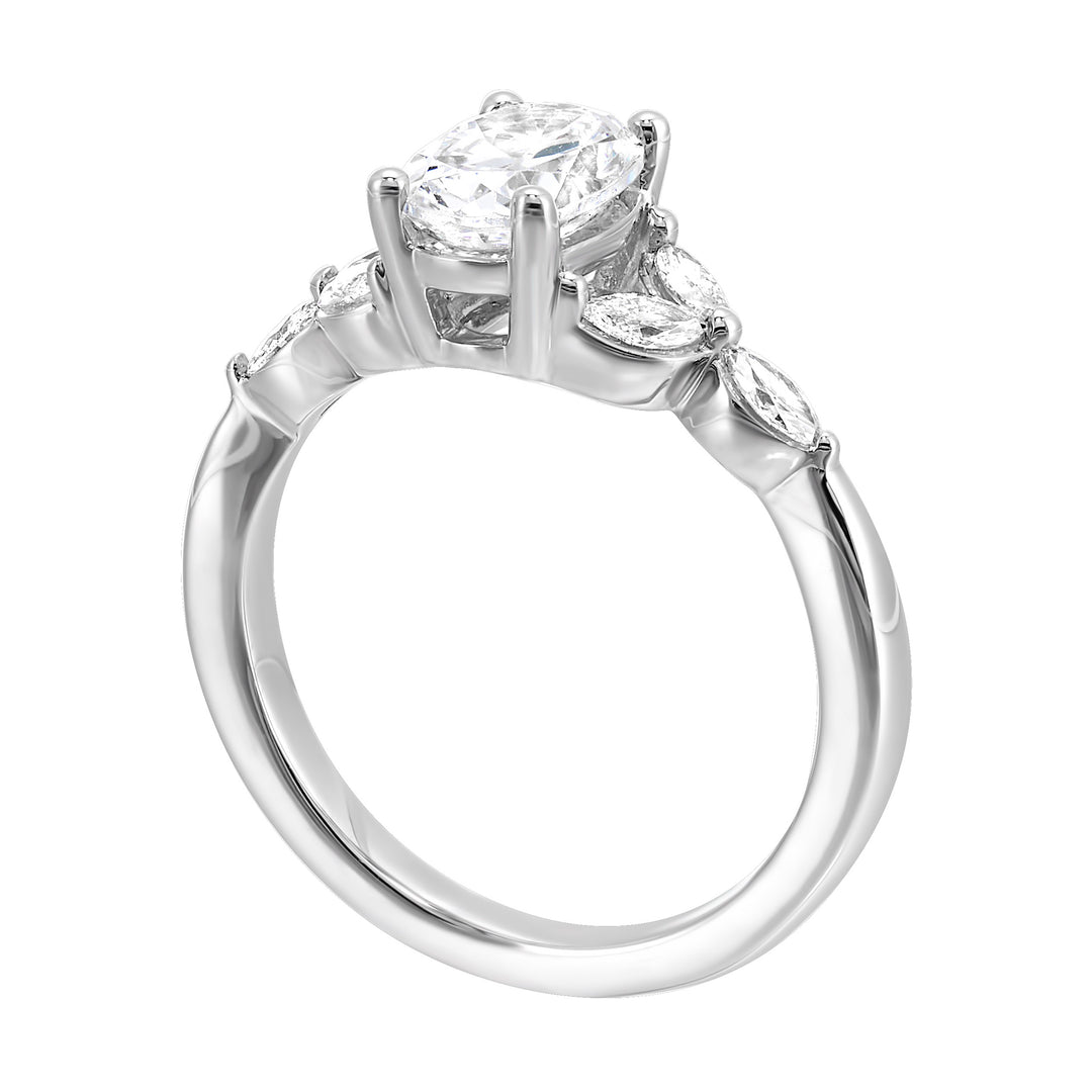 Elongated oval diamond takes center stage, framed by graceful trinity of marquise diamonds set on either side followed by a pinch shank is sure to flatten her.