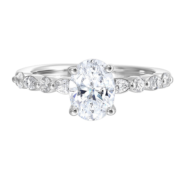 A magnificent oval diamond takes center stage, framed by a breathtaking alternation of fancy and round diamonds is sure to delight her.
