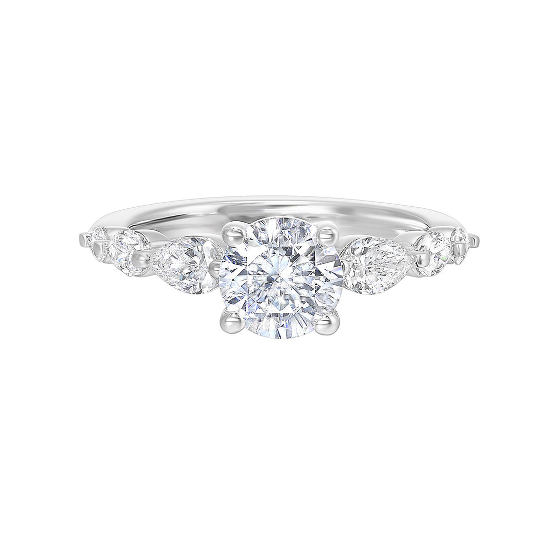 Round solitaire meets graduating pear cut diamonds set in common prongs blending classic elegance with contemporary style.