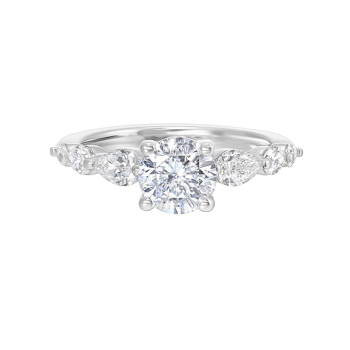 Round solitaire meets graduating pear cut diamonds set in common prongs blending classic elegance with contemporary style.
