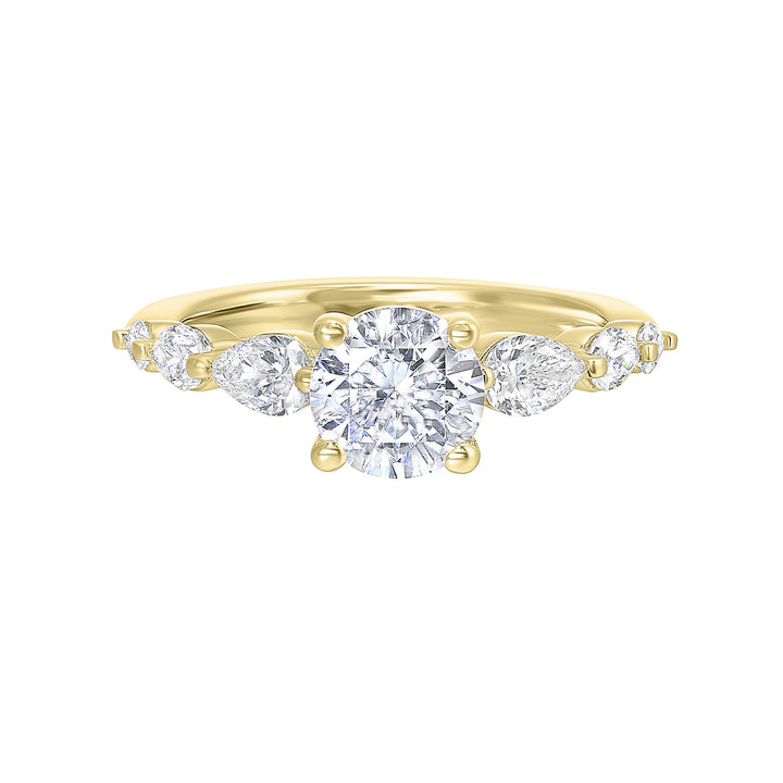 Round solitaire meets graduating pear cut diamonds set in common prongs blending classic elegance with contemporary style.