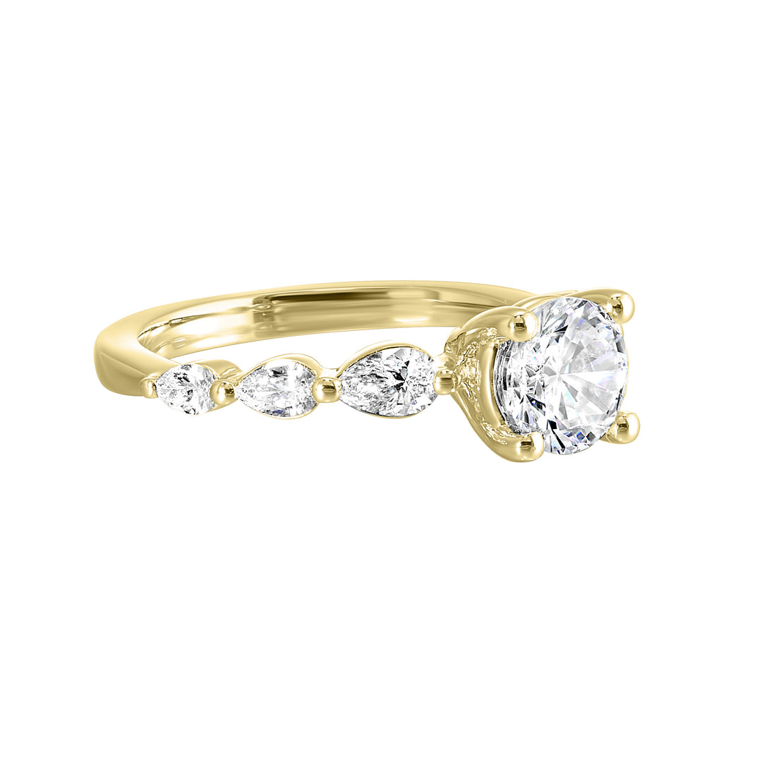 Round solitaire meets graduating pear cut diamonds set in common prongs blending classic elegance with contemporary style.