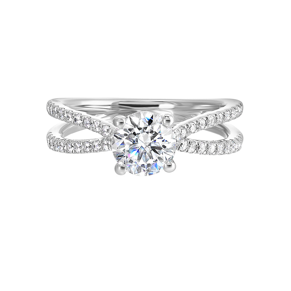 Criss cross bands of diamonds cross in a perfect X that highlights the center solitaire diamond is sure to highlight her style.
