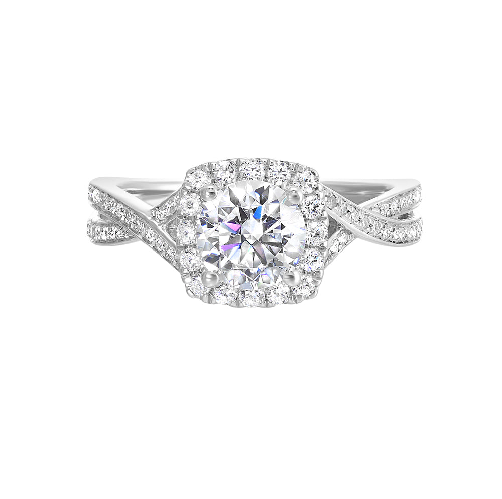 Modern classic solitaire featuring a cushion halo around the solitare and entwined diamonds studded in shank is a perfect choice.