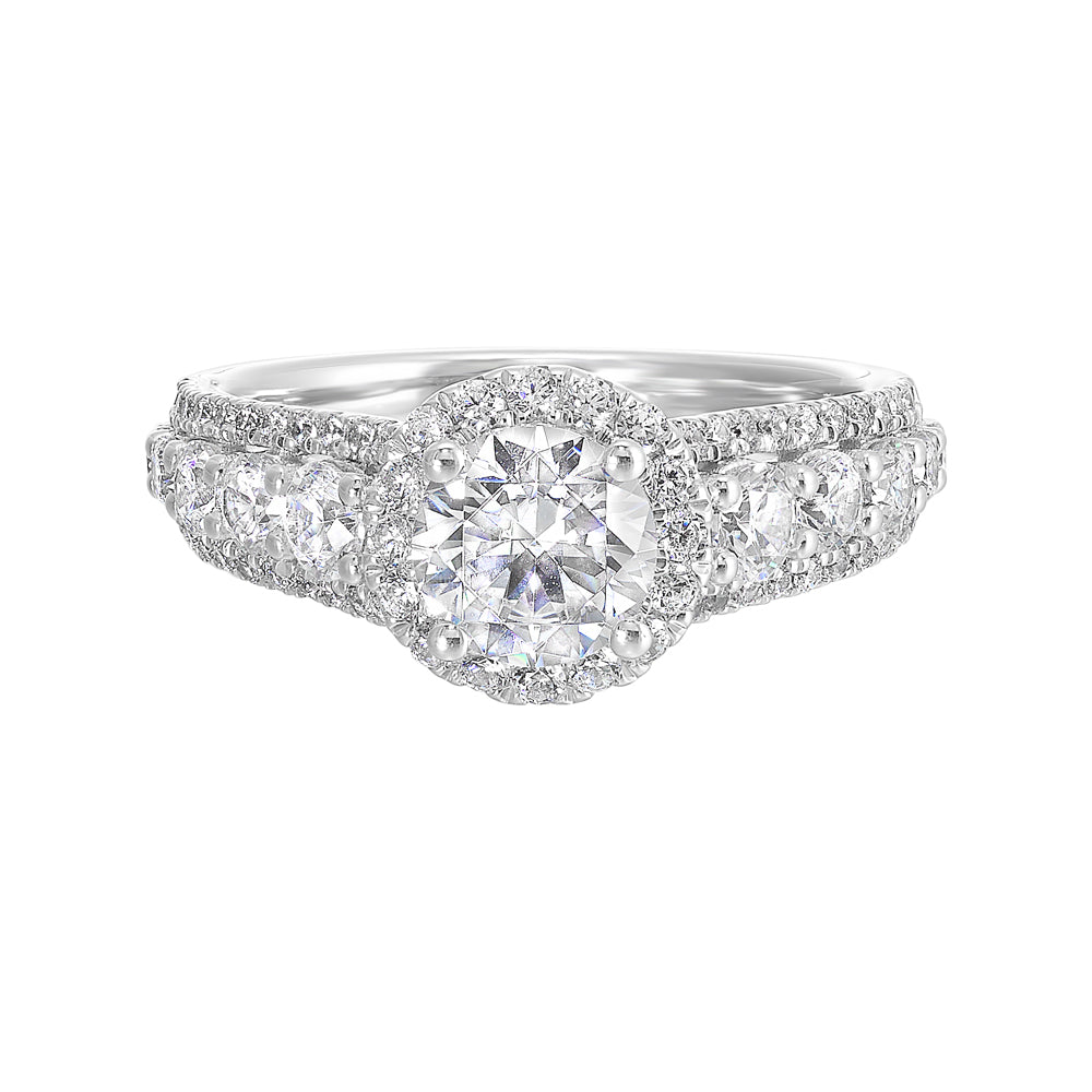 Large diamond set in center are sure to dazzle and delight the one you love with tapered three row look.