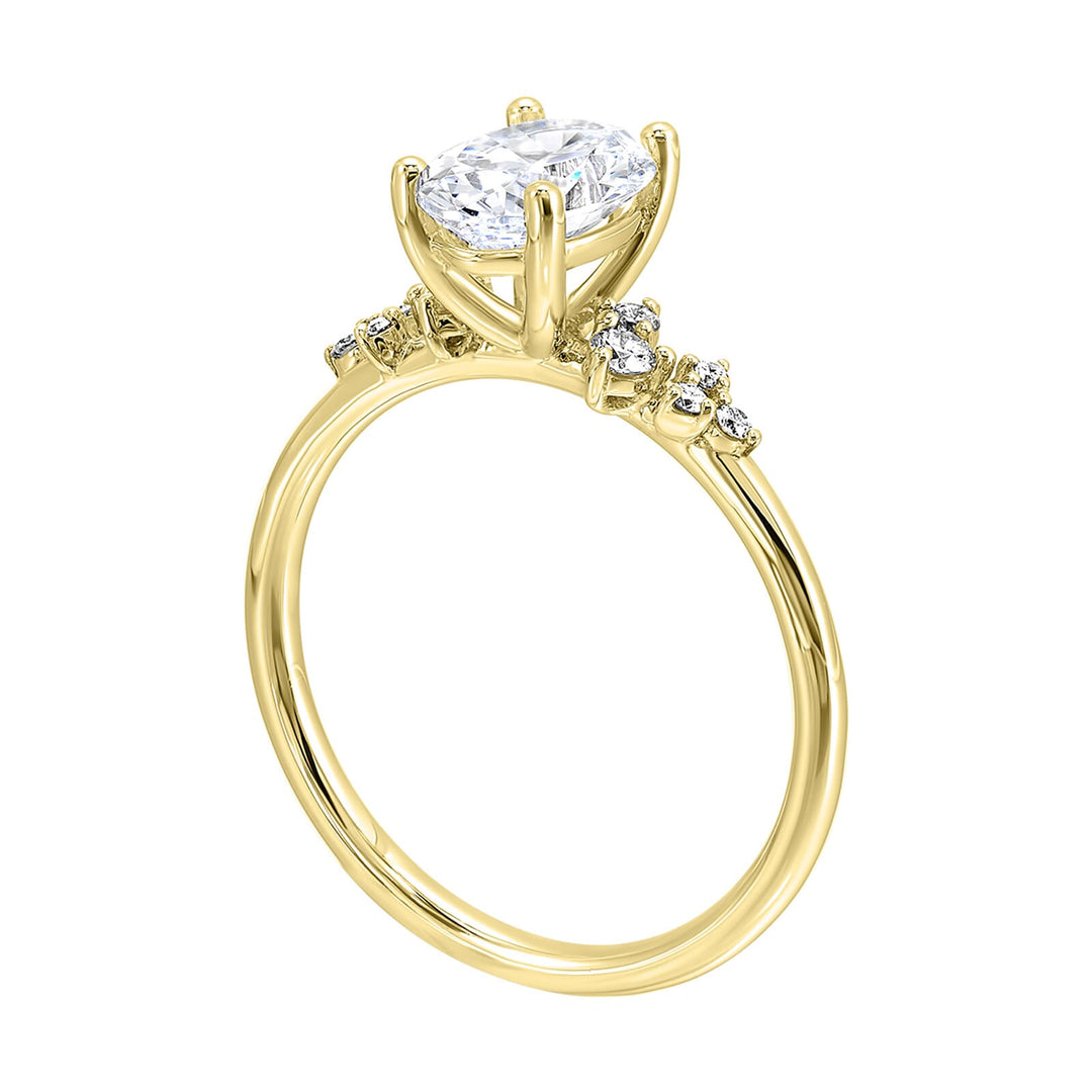 This simply gorgeous engagement ring with oval center features a sleek gold band with floating diamonds on either sides in random placement coming together beautifully.