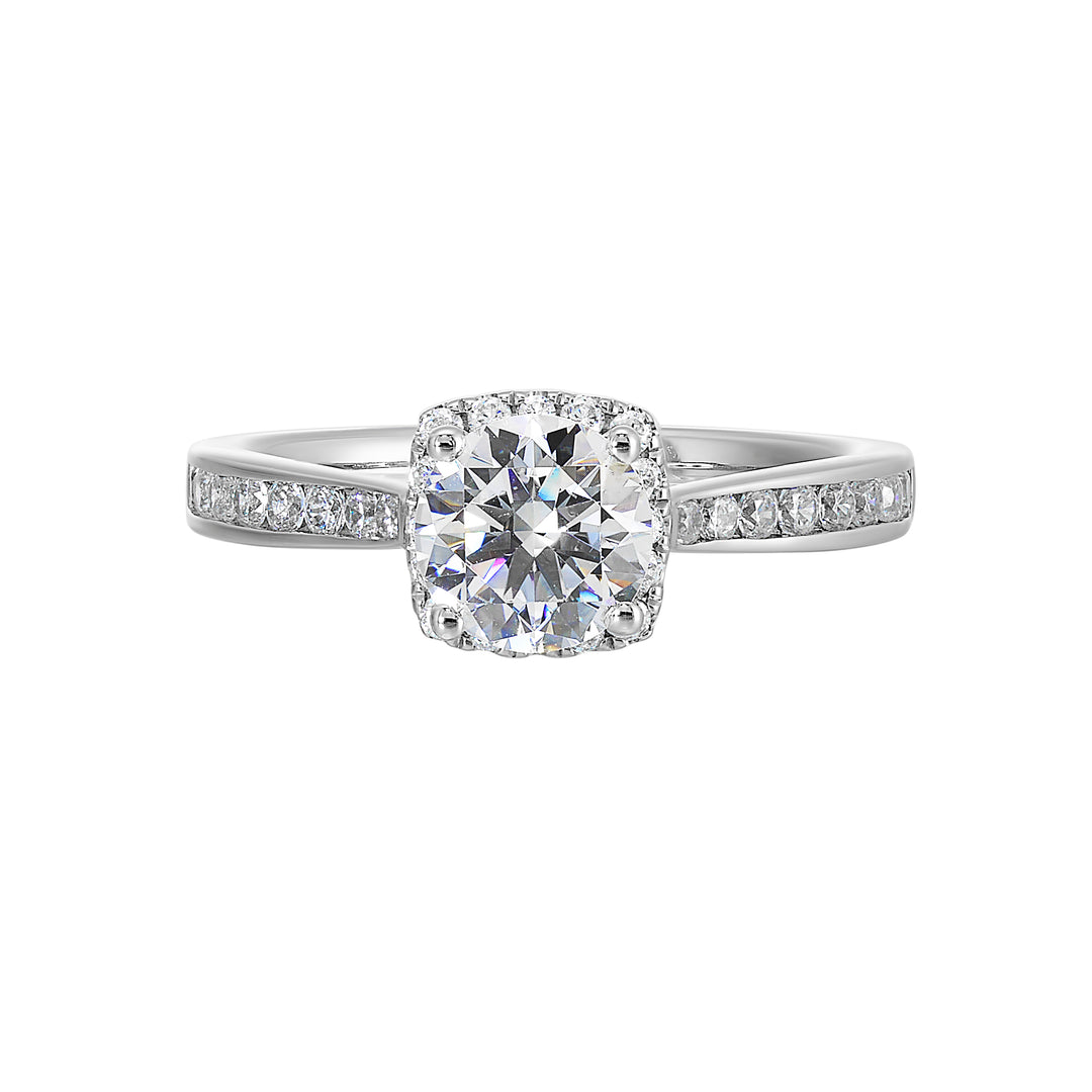 Cushion diamond halo engagement ring with a channel set diamond band is the perfect representation of high end elegance.