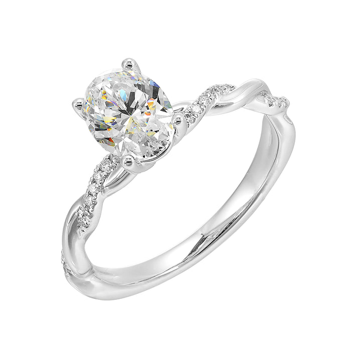 This ring is is sure to surprise her, featuring an oval center which is further enhanced by play of diamond and metal twist shank.