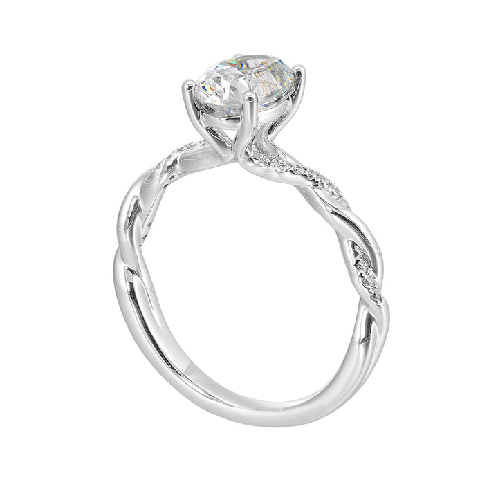 This ring is is sure to surprise her, featuring an oval center which is further enhanced by play of diamond and metal twist shank.