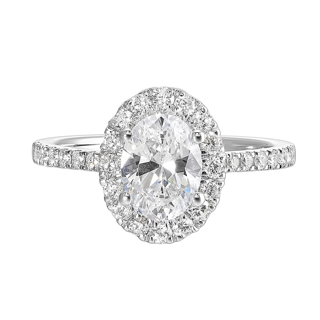 Oval solitaire halo ring with sleek diamond studded shank, this design offers a romantic look for your special moments.