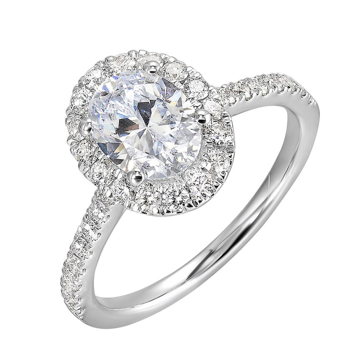 Oval solitaire halo ring with sleek diamond studded shank, this design offers a romantic look for your special moments.