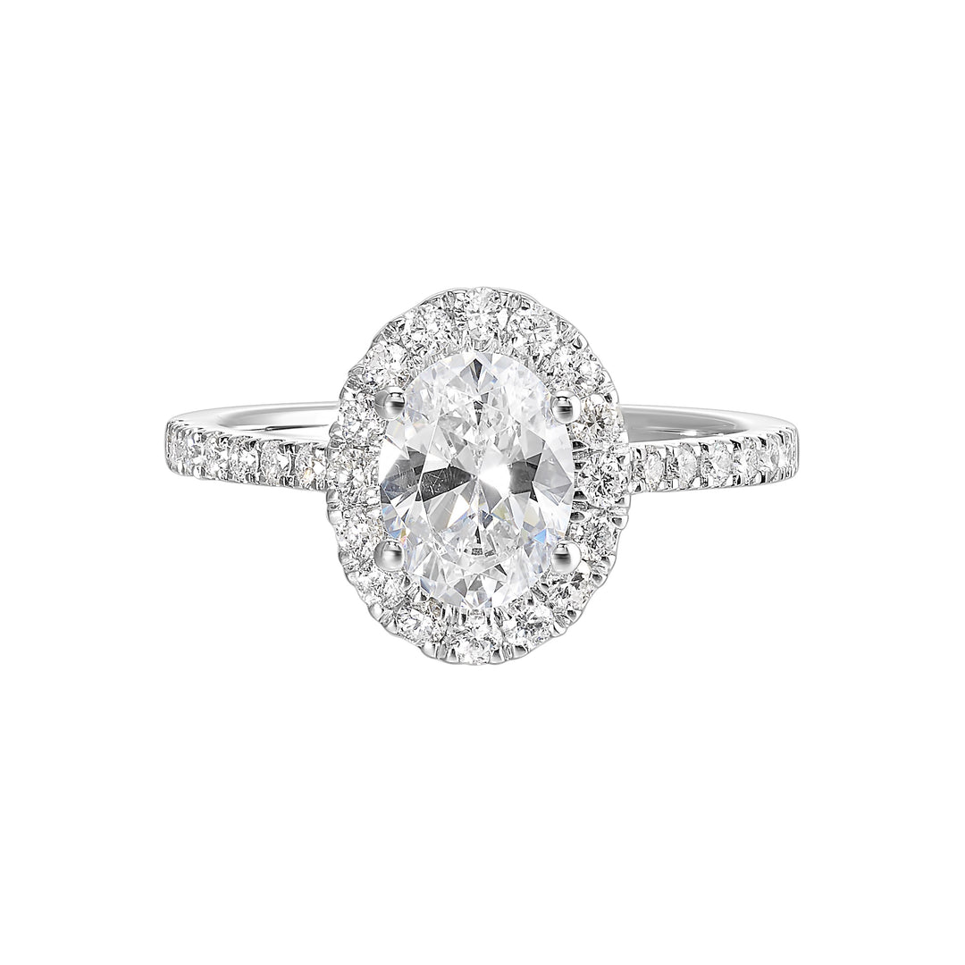 Oval solitaire halo ring with sleek diamond studded shank,  this design offers a romantic look for your special moments.