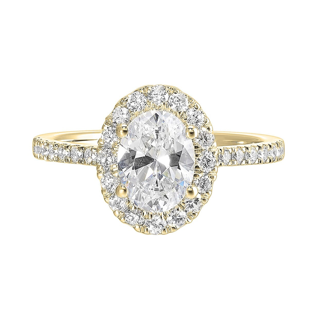 Oval solitaire halo ring with sleek diamond studded shank, this design offers a romantic look for your special moments.