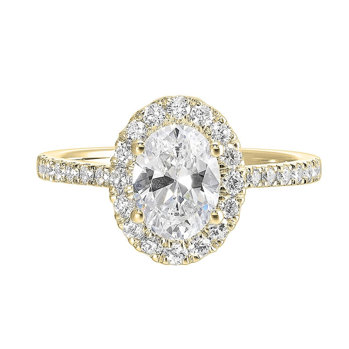 Oval solitaire halo ring with sleek diamond studded shank, this design offers a romantic look for your special moments.