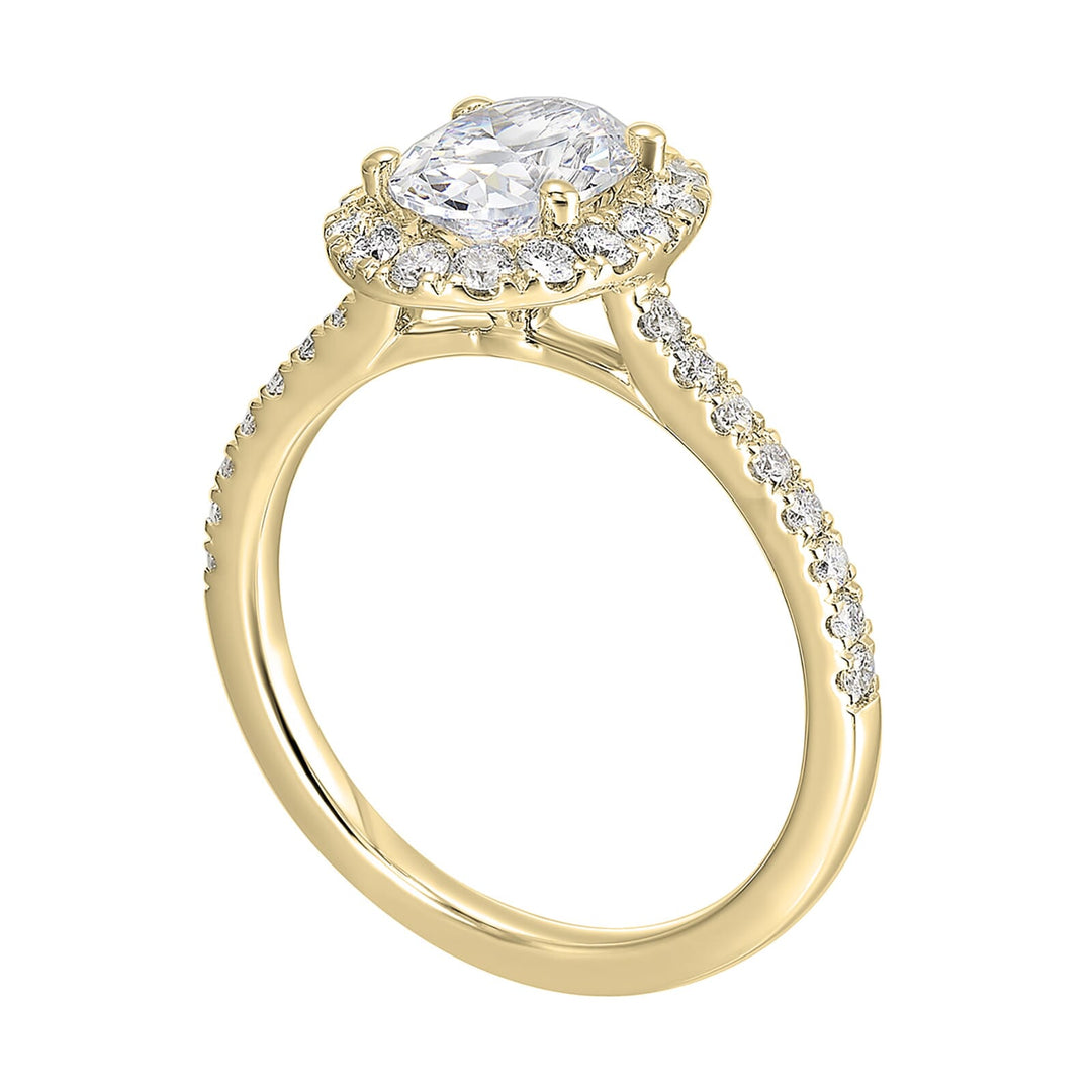 Oval solitaire halo ring with sleek diamond studded shank, this design offers a romantic look for your special moments.