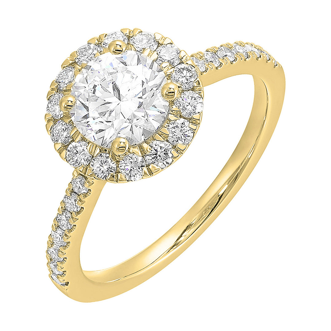 Dazzle with classic round solitaire framed by a sparkling halo. The studded shank adds a touch of classic look, making this ring a timeless symbol of elegance.