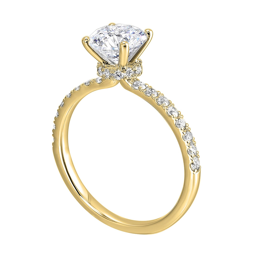 Shine from every angle with this gorgeous round solitaire hidden halo engagement ring. This timeless design offers elegance making it everlasting symbol of your love.
