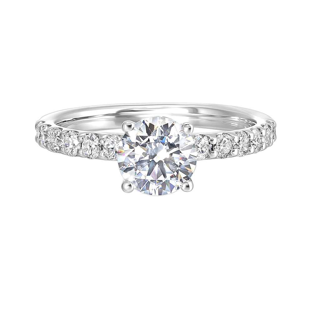 A solitaire ring sparkles further with diamond studded shank displaying timeless elegance and dazzling brilliance is a classic choice.