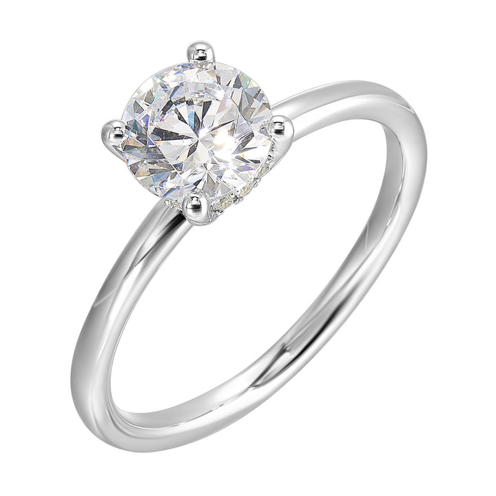 The dazzling solitare diamond take center stage. The petite band adds to the sleek,  classic look.