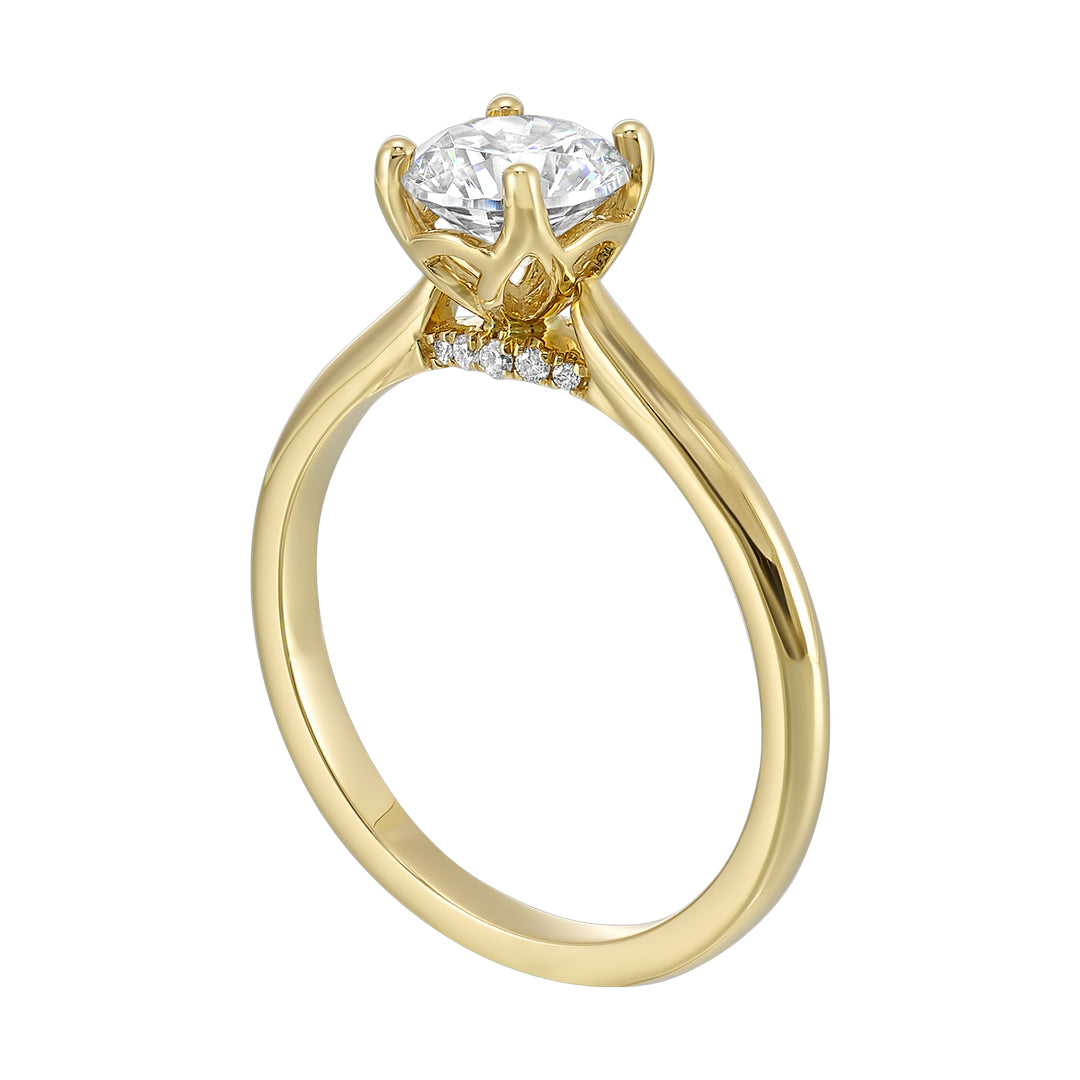 Delicate solitaire ring features a thin metal band that showcases a beaded milgrain in center with added glitters of diamonds in front.