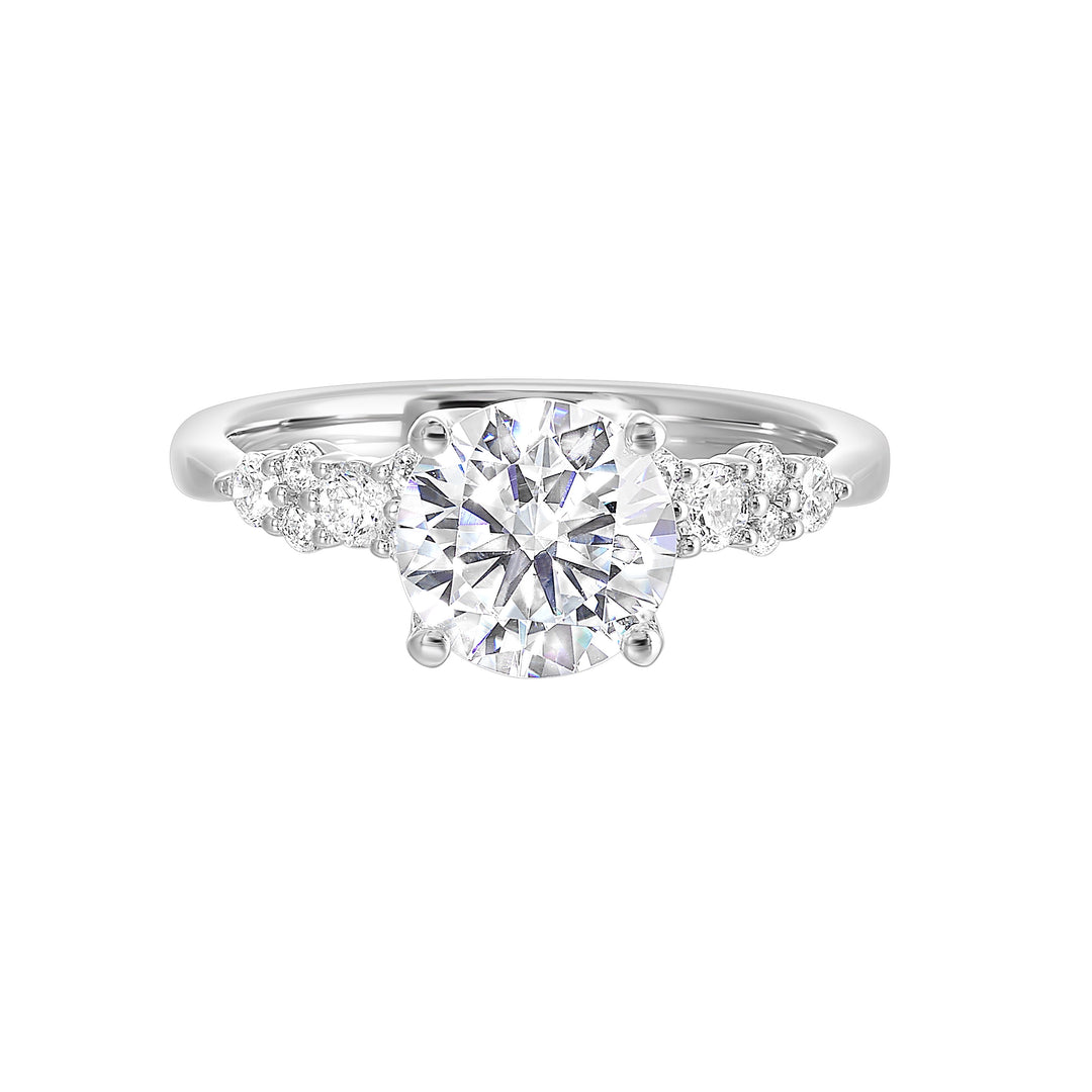 Glamorous solitare engagement ring dazzles with round diamonds set in lustrous pattern.