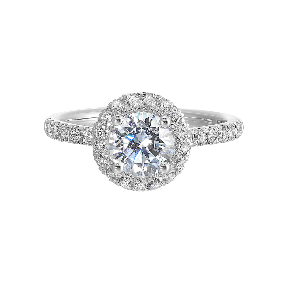 Sparkling center showcases a stunning halo followed by a delicate micro pave shank, perfect to add sparkles to your evening.