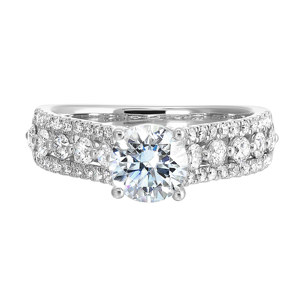 A triple row engagement ring with bigger diamond in center complemented by two micro row of diamonds on either side is perfect to sparkle your evening.
