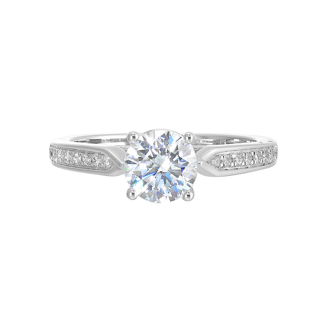 An elegant tapered pave set shank is adorned with diamonds while an integrated solitare head sits on it perfectly.