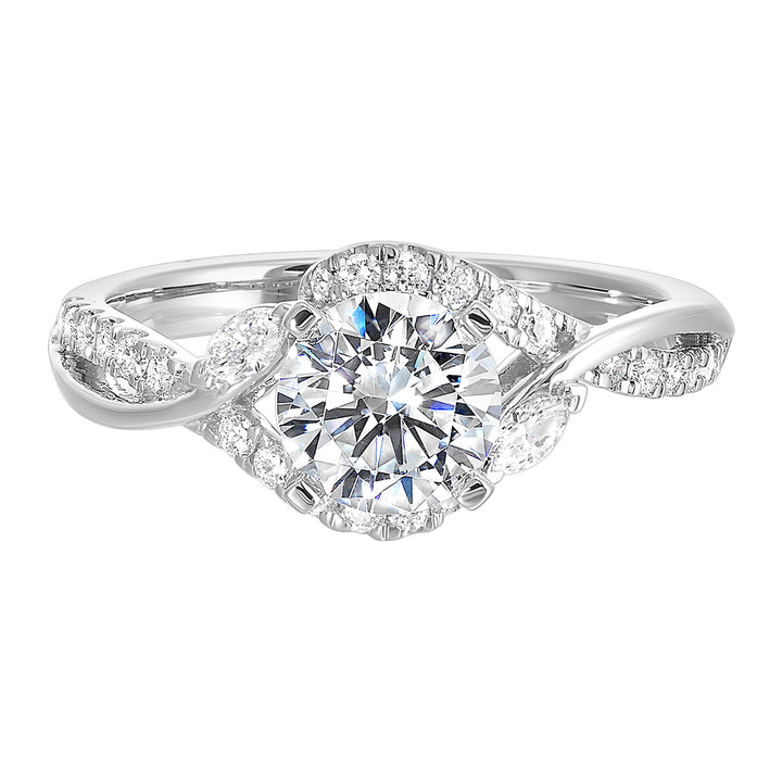 A nature inspired twist on the classic three stone ring. This ring features interwined look with play of pave diamonds and metal.