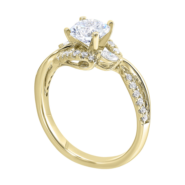 A nature inspired twist on the classic three stone ring. This ring features interwined look with play of pave diamonds and metal.